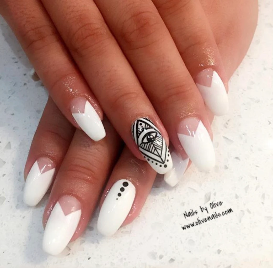 White geometric nail art with eye detail, Queen Nails Bar and Spa