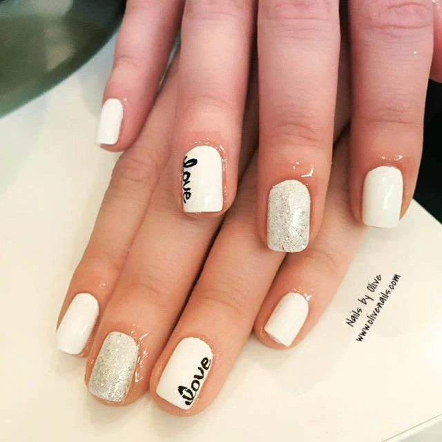 White gel nails with silver glitter and love script art, Queen Nails Bar, Woodbridge ON